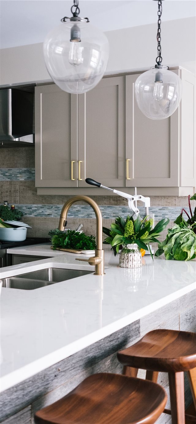 1125x2436 Nicely designed white kitchen with lots of greener... - green iPhone X Wallpaper