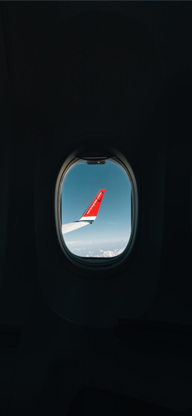 1125x2436 red airplane wing through window -  iPhone X Wallpaper