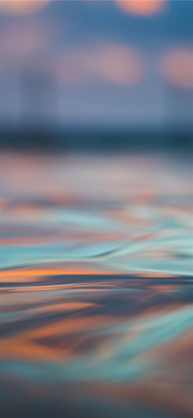 1125x2436 long exposure photography of body of water - blue iPhone X Wallpaper