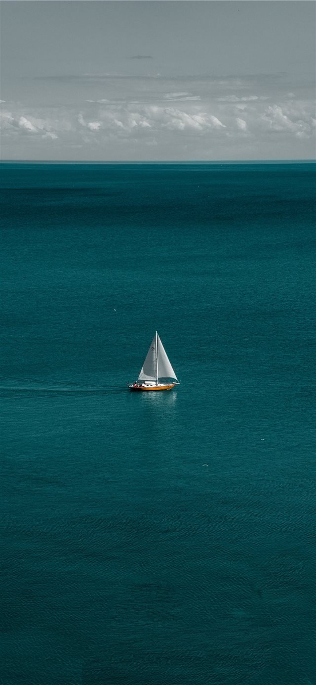 1125x2436 white and brown boat in body of water - water iPhone X Wallpaper