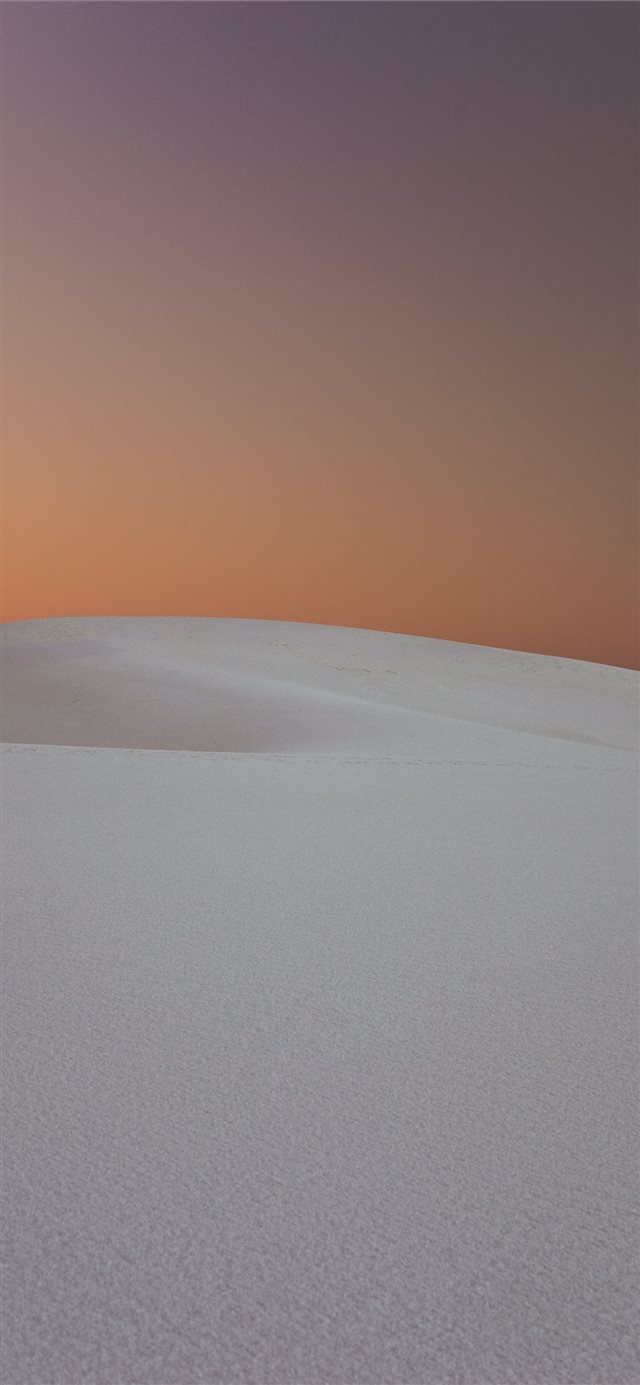 1125x2436 person walking in the desert dunes - white sands national monument iPhone X Wallpaper