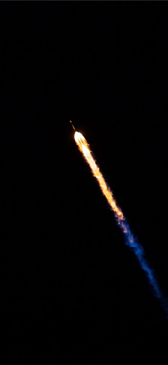 1125x2436 rocking flying in sky during night time - firework iPhone X Wallpaper