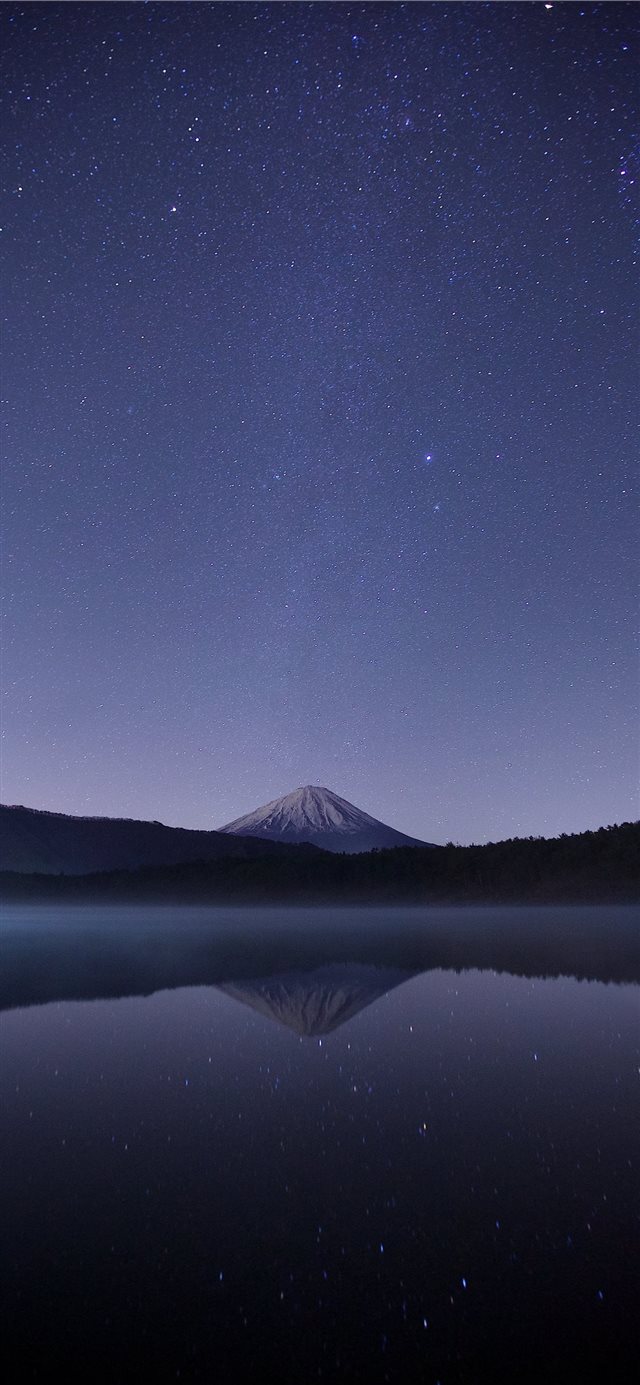 1125x2436 calm body of water near alp mountains during night... - space iPhone X Wallpaper