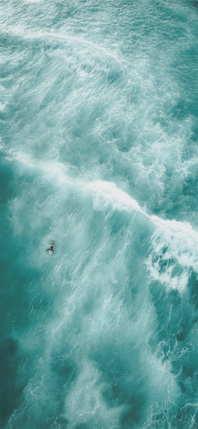 1125x2436 birds eye view photo of a person on body of water - blue iPhone X Wallpaper