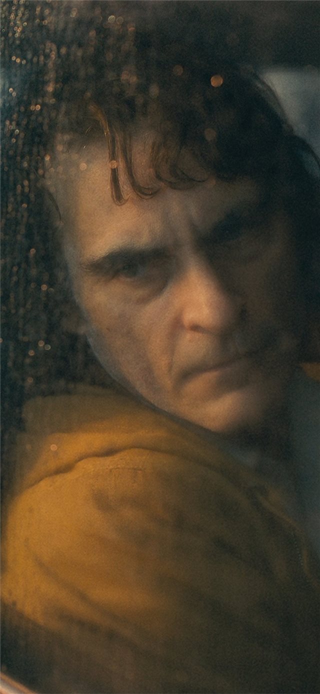 1125x2436 joaquin phoenix in joker movie 4k - joker iPhone X Wallpaper