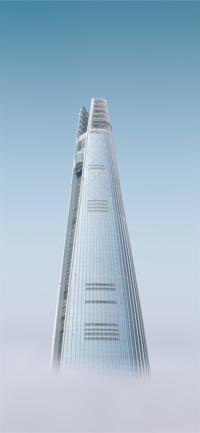 1125x2436 white high rise building with fog - city iPhone X Wallpaper