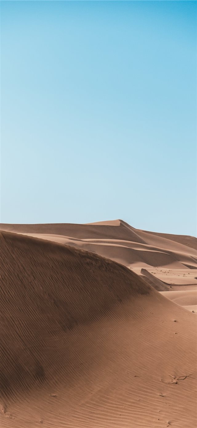 1125x2436 brown sand under white cloudy sky - desert iPhone X Wallpaper