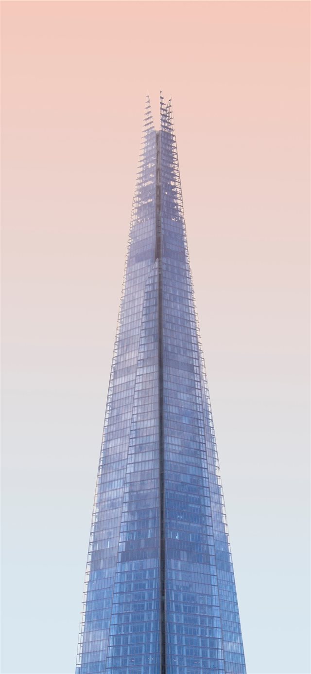 1125x2436 low angle photography of tower - city iPhone X Wallpaper