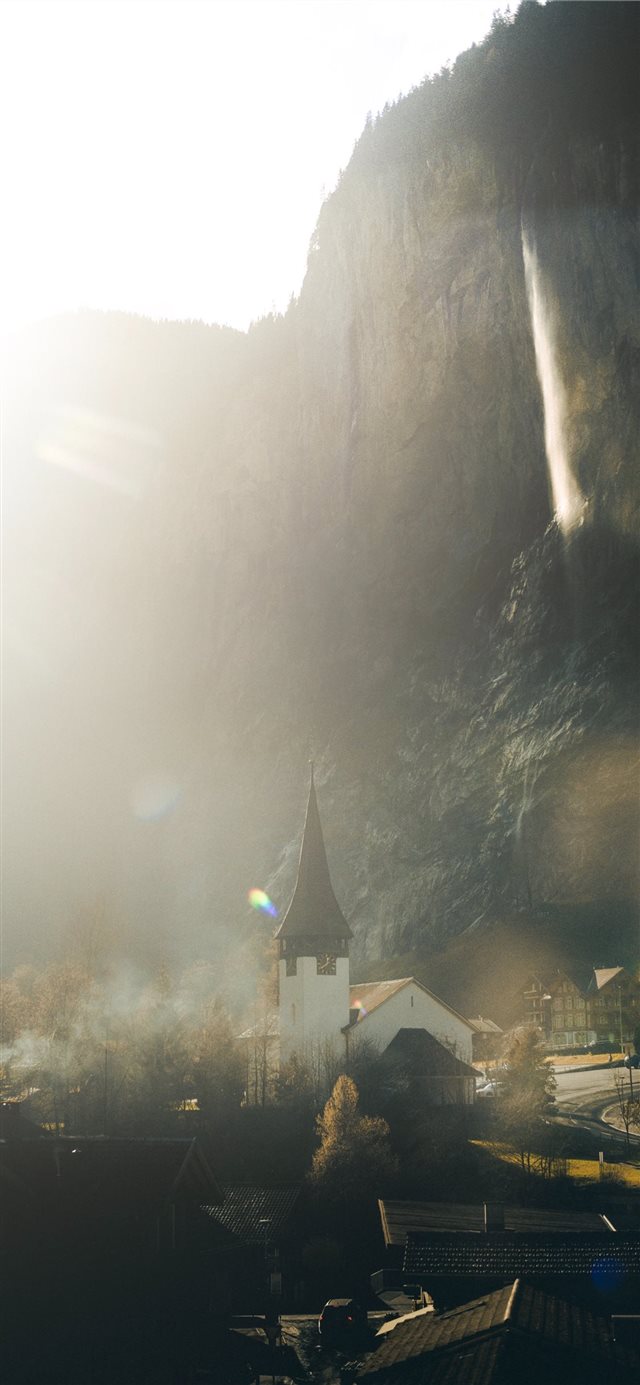1125x2436 white concrete house near mountain - city iPhone X Wallpaper