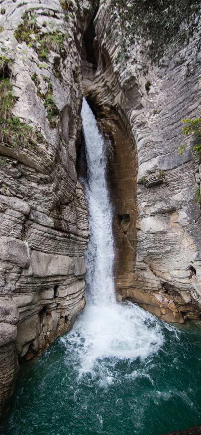 1125x2436 waterfalls during daytime - mountain iPhone X Wallpaper