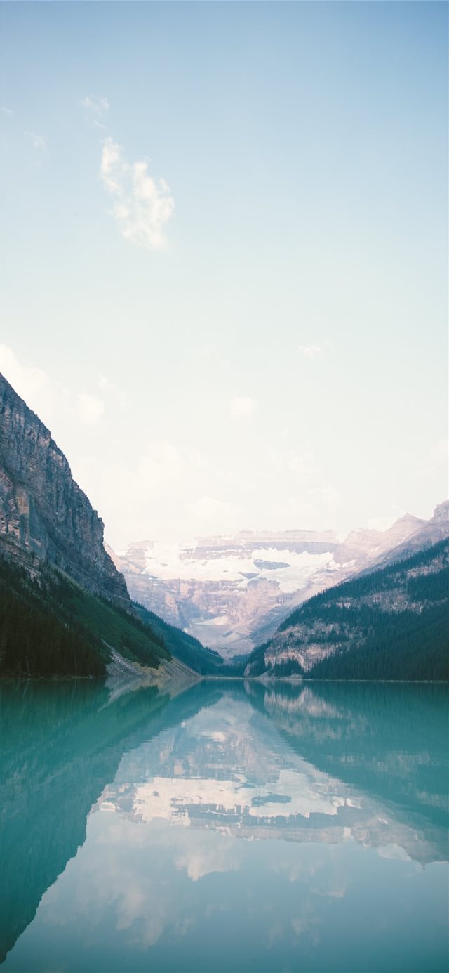 1125x2436 photo of two mountains - snow iPhone X Wallpaper