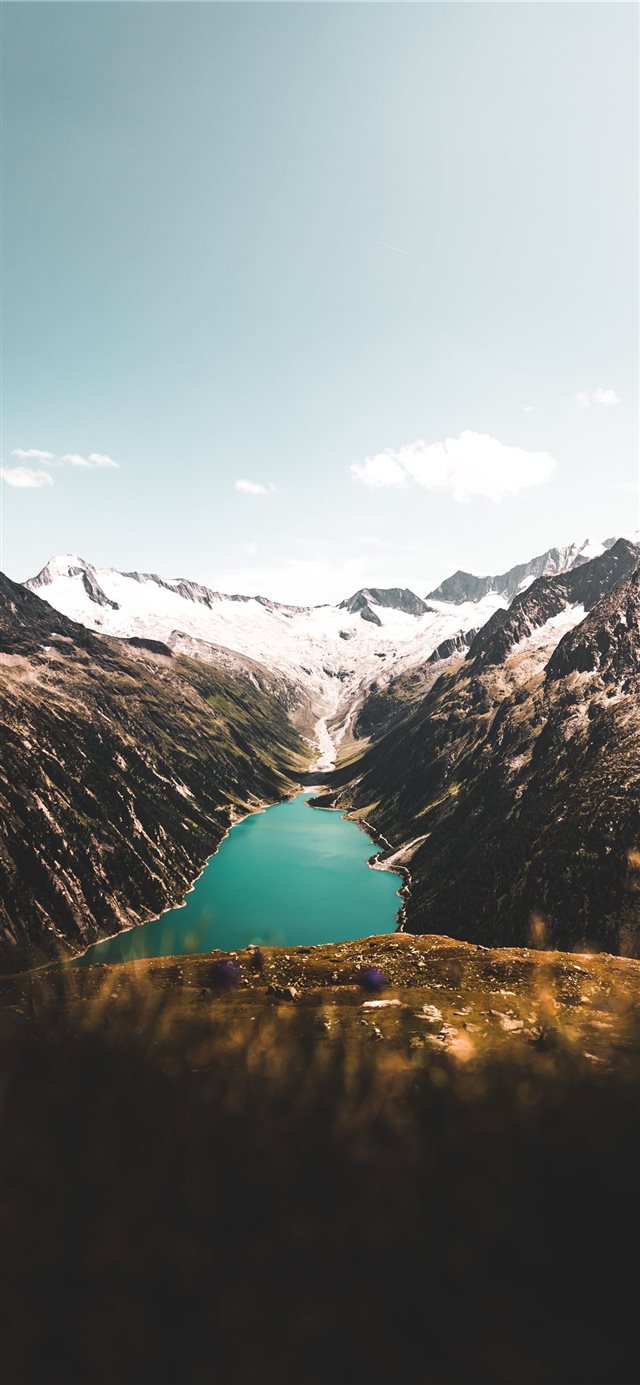 1125x2436 aerial photography of body of water between mounta... - snow iPhone X Wallpaper