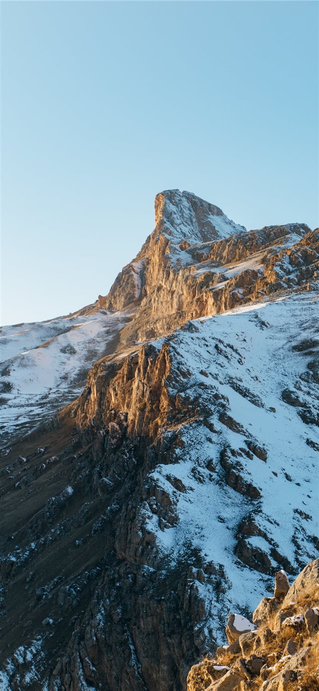 1125x2436 snow covered mountain during daytime - mountain iPhone X Wallpaper