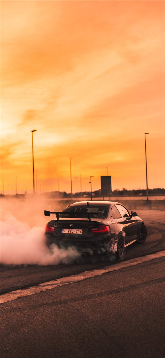 1125x2436 black car drifting on road during day - car iPhone X Wallpaper
