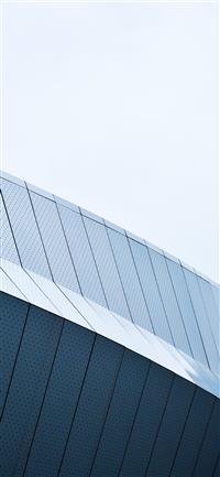 blue wall during daytime wallpaper