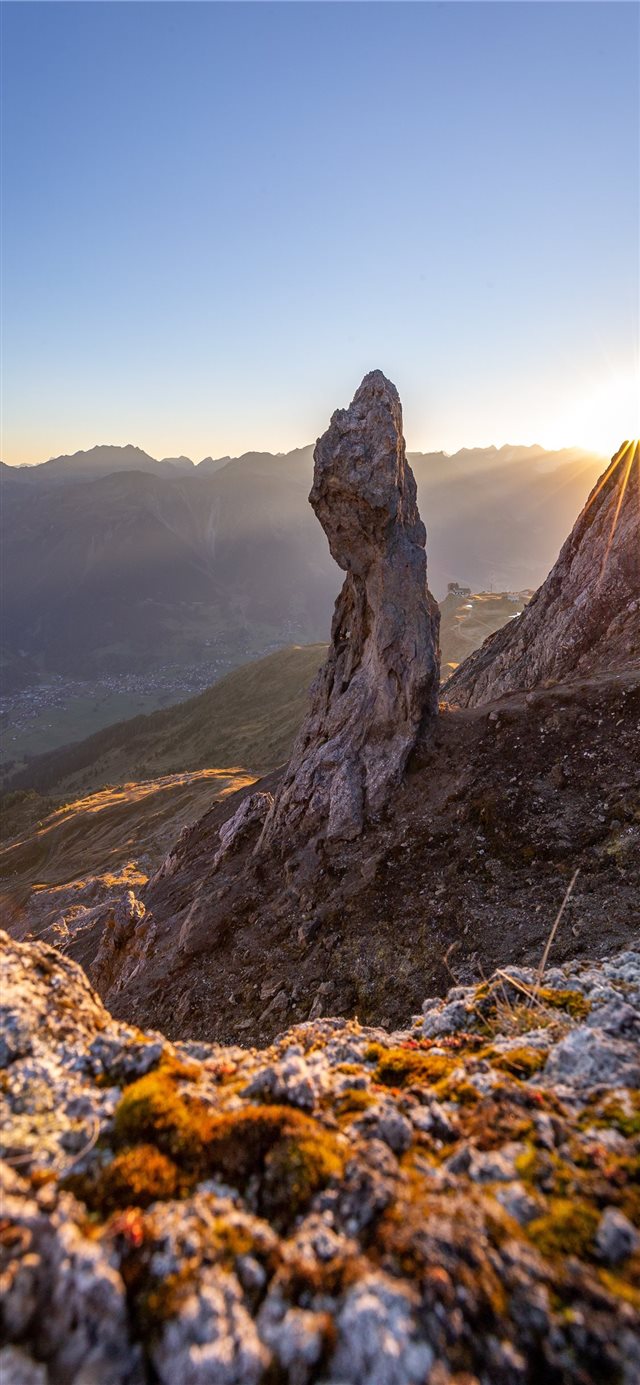 1125x2436 stone formation during daytime - mountain iPhone X Wallpaper