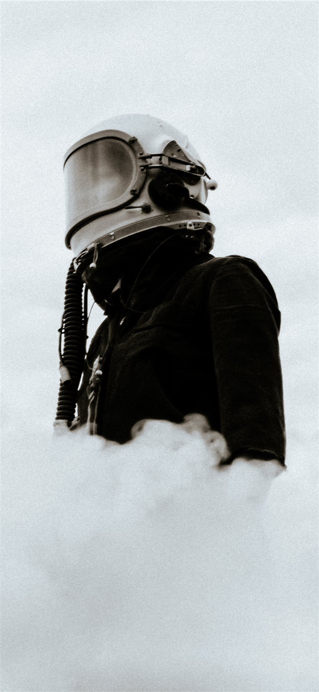 1125x2436 man in black jacket -  iPhone X Wallpaper