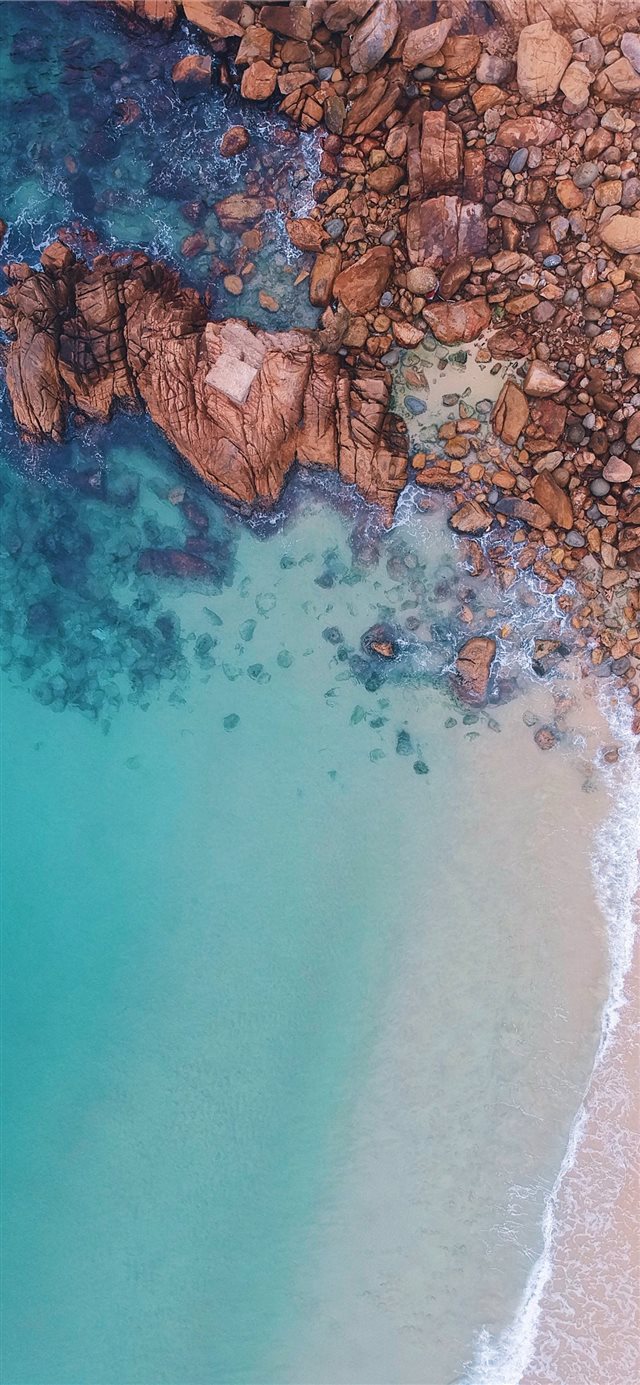 1125x2436 aerial view of rocks near body of water - landscape iPhone X Wallpaper