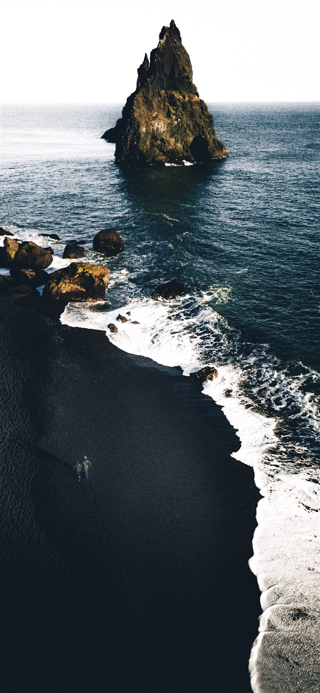 1125x2436 brown cliffs on ocean - landscape iPhone X Wallpaper