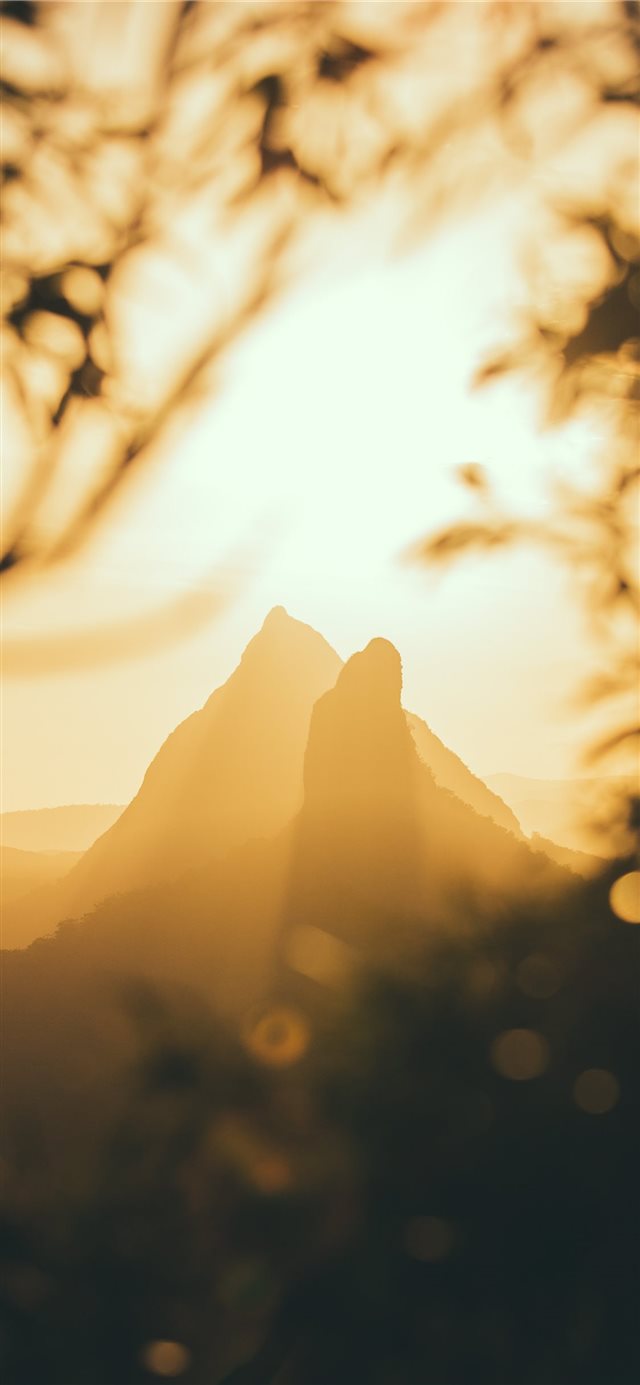 1125x2436 mountains under golden hour - sky iPhone X Wallpaper