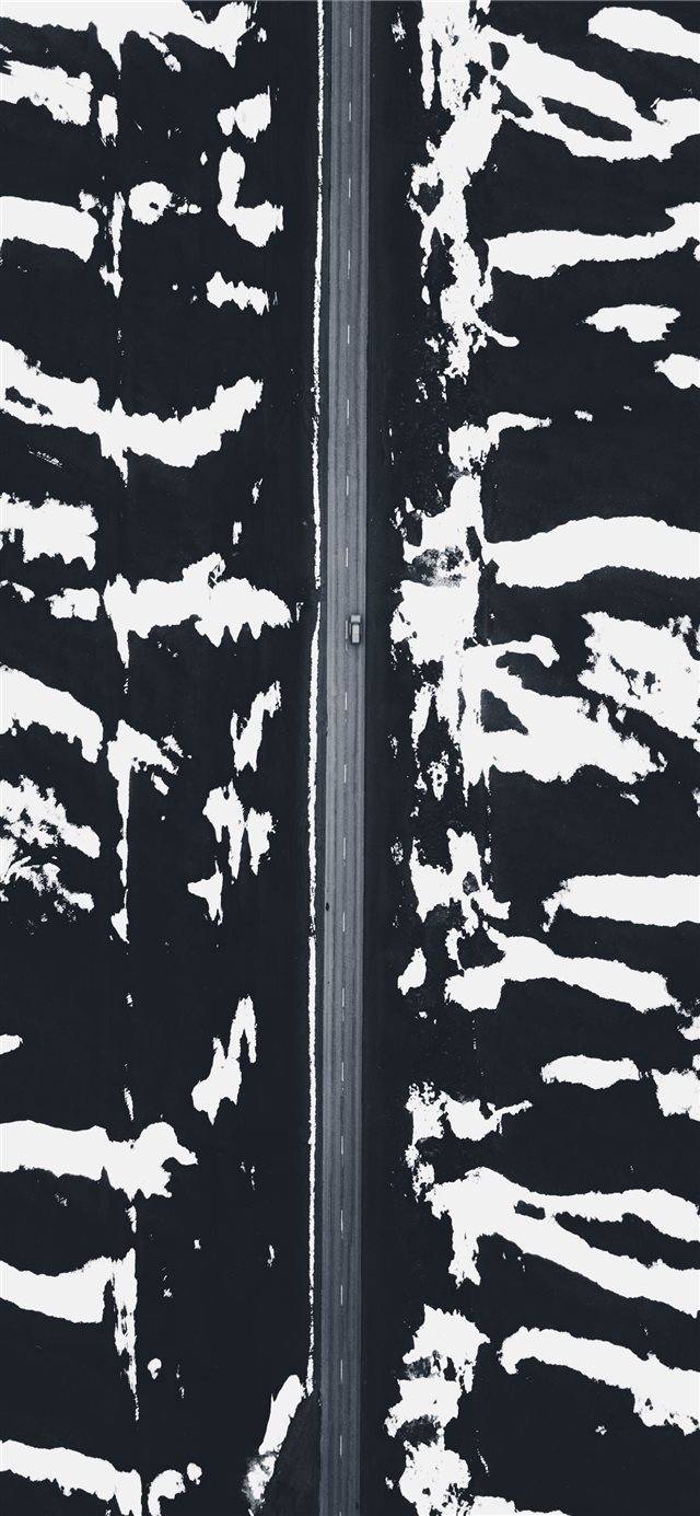 1125x2436 aerial photography of road between mountains - iceland iPhone X Wallpaper