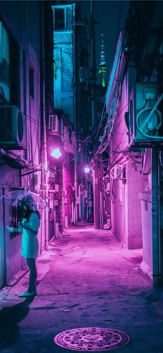1125x2436 woman holding umbrella while standing outside of b... - city iPhone X Wallpaper