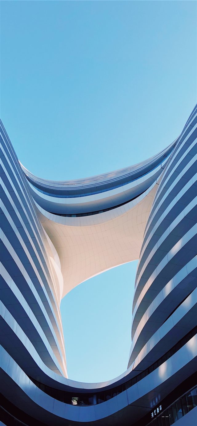 1125x2436 white concrete building during daytime - window iPhone X Wallpaper