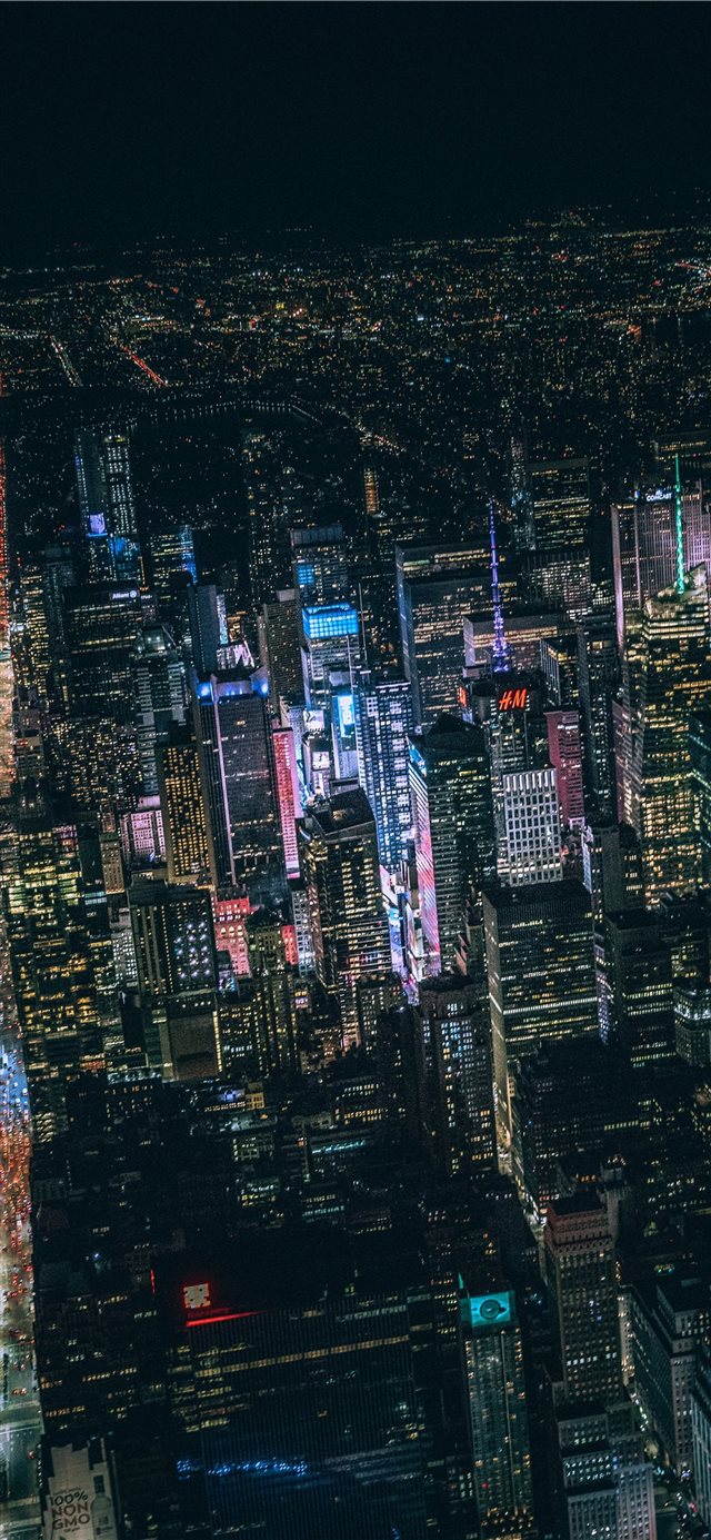 1125x2436 aerial view of city buildings during night time - new york iPhone X Wallpaper