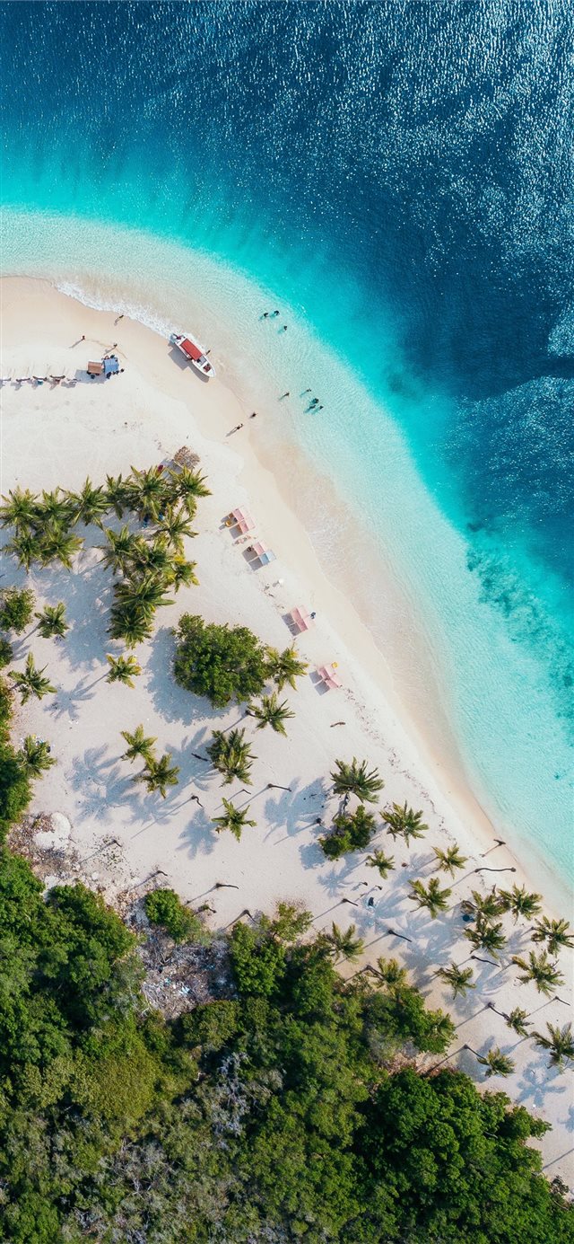1125x2436 people on beach island during daytime - water iPhone X Wallpaper