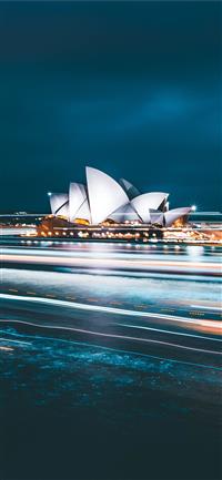 Sydney Opera House during nighttime wallpaper