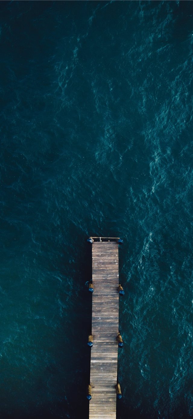 1125x2436 brown wooden bridge on body of water - united states iPhone X Wallpaper