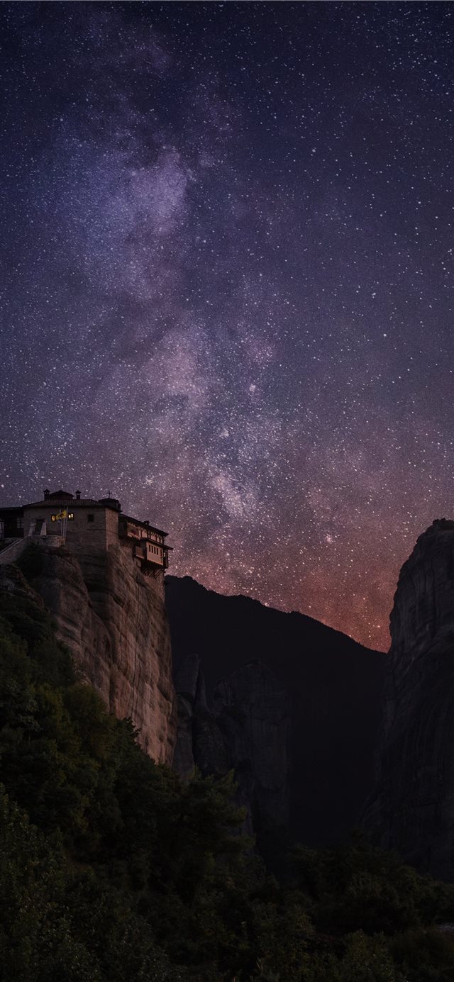 1125x2436 milky way above rocks - outer space iPhone X Wallpaper