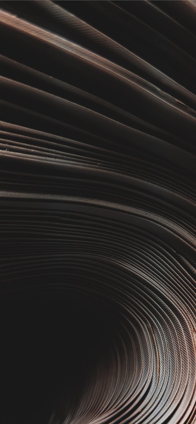 1125x2436 closeup photo of multiple layers of leather - abstract iPhone X Wallpaper