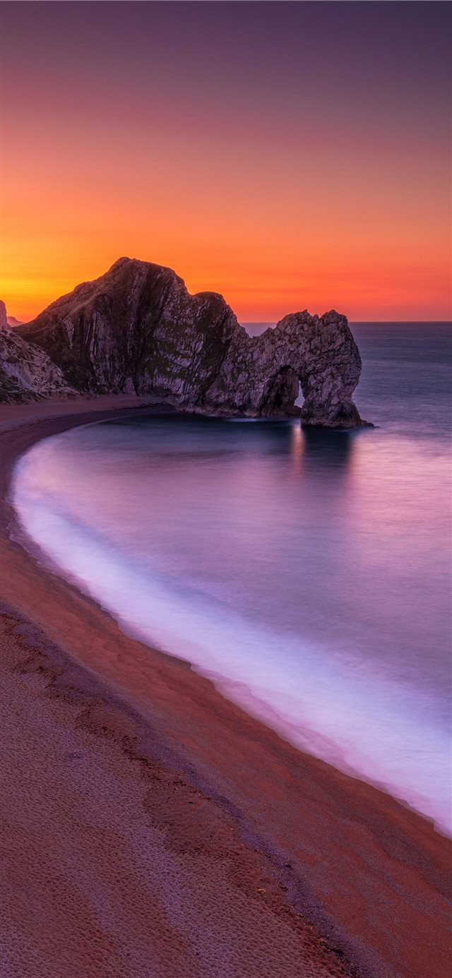 1125x2436 sea cliff during golden hour - cave iPhone X Wallpaper