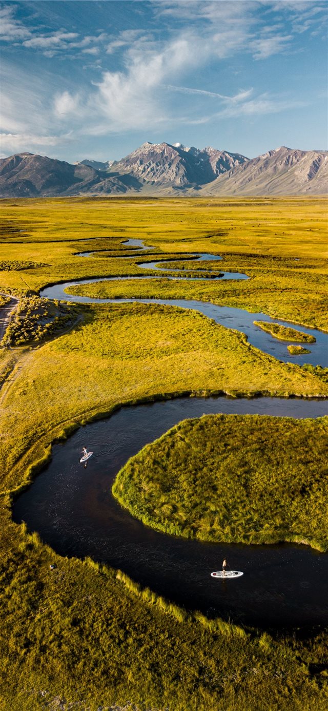 1125x2436 aerial photo of grass field under cloudy sky - landscape iPhone X Wallpaper