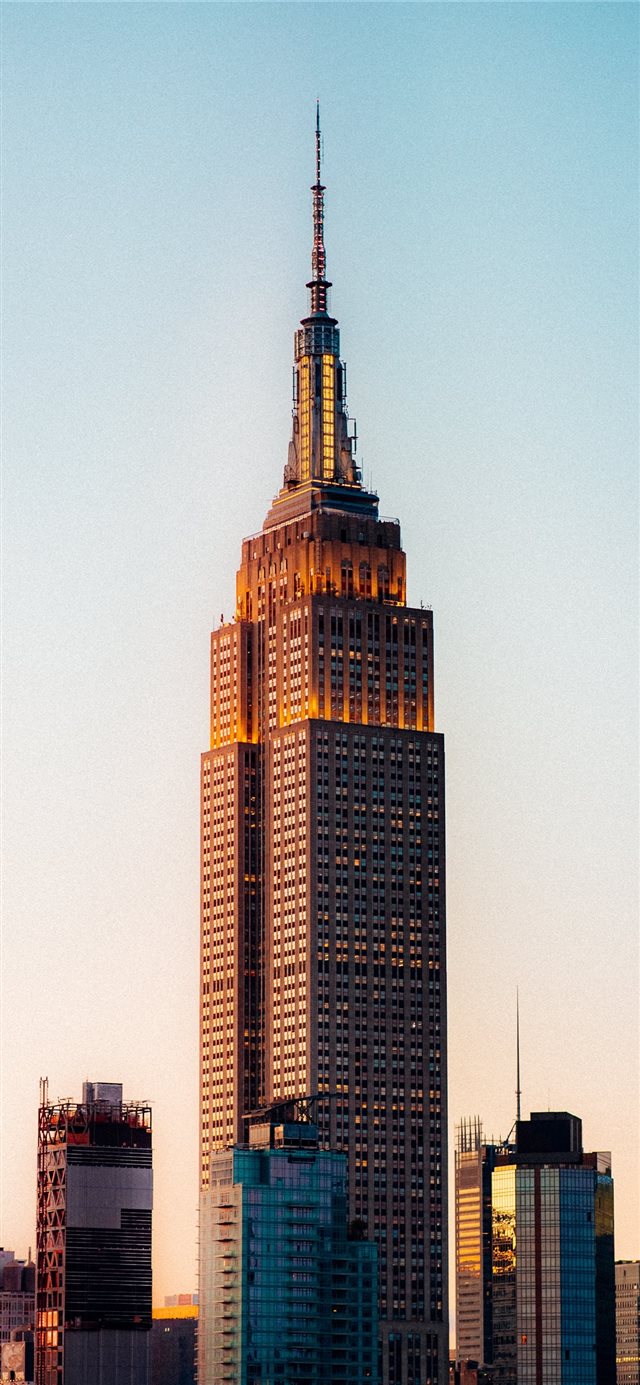 1125x2436 brown and black high rise building - ny iPhone X Wallpaper