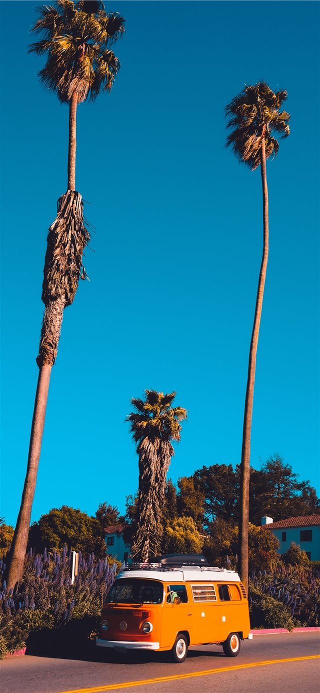 1125x2436 yellow van on road during daytime - san francisco iPhone X Wallpaper