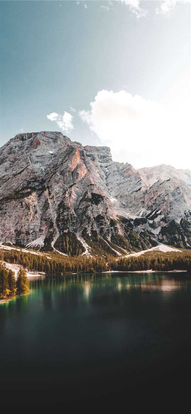 1125x2436 lake near mountain under blue sky during daytime - scenery iPhone X Wallpaper