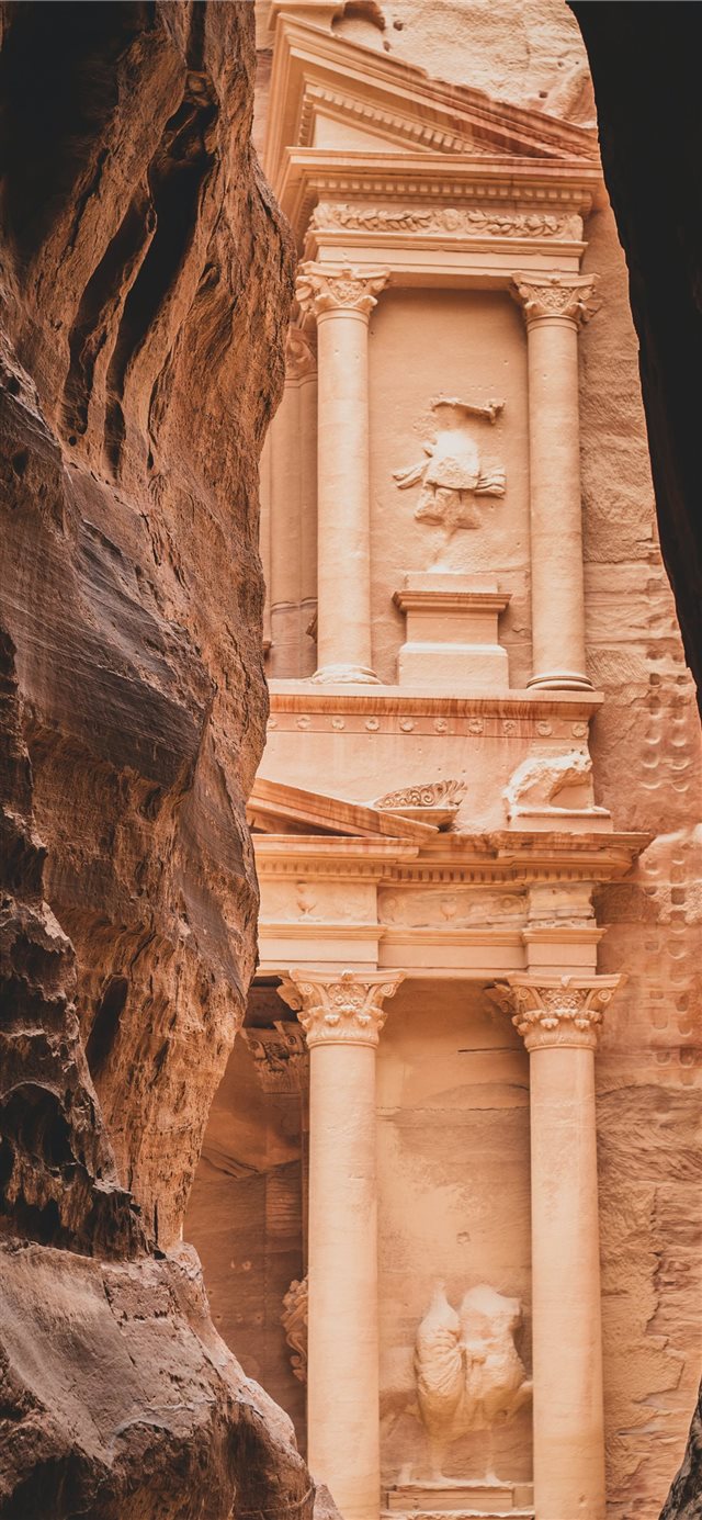 1125x2436 brown rock formation during daytime - mountain iPhone X Wallpaper