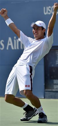 Kei Nishikori celebrates his US Open semifinal vic... wallpaper