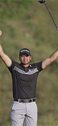 Emotions flow as Day breaks through with PGA title wallpaper