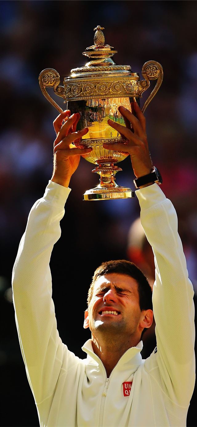 1125x2436 Roger Federer of Switzerland poses with the runner... - novak djokovic iPhone X Wallpaper