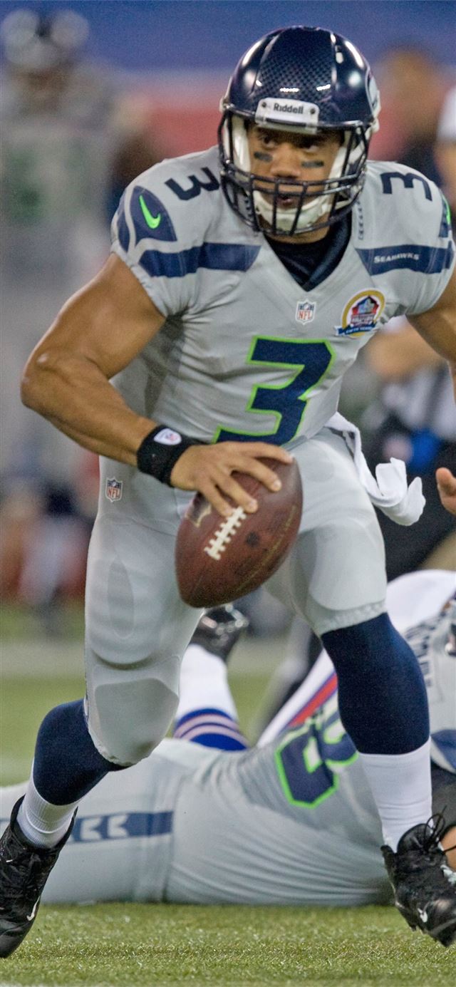 1125x2436 Russell Wilson - american football celebrity iPhone X Wallpaper