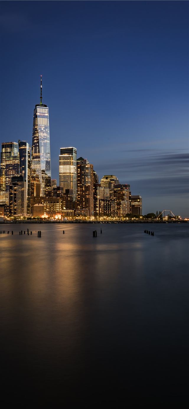 1125x2436 cityscape photography during nighttime - water iPhone X Wallpaper
