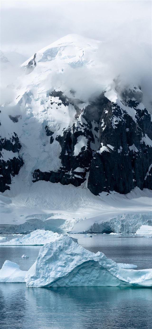 1125x2436 small iceberg beside large iceberg - mountain iPhone X Wallpaper