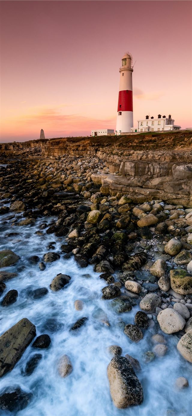 1125x2436 lighthouse near body of water - bird iPhone X Wallpaper