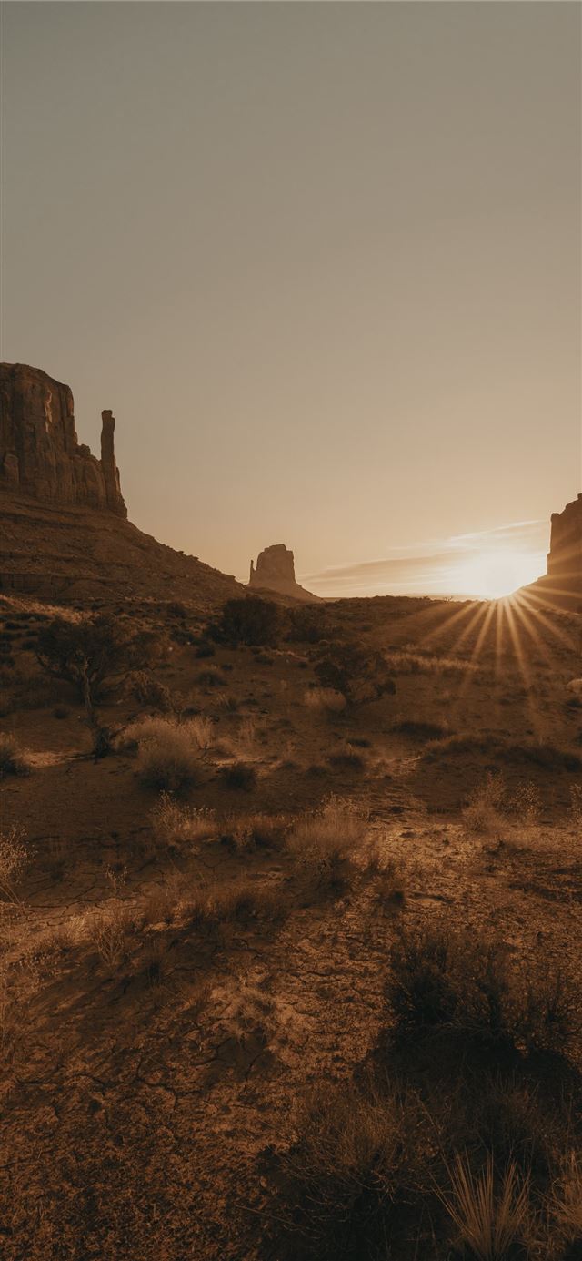 1125x2436 brown rock formation under white sky during daytim... - usa iPhone X Wallpaper
