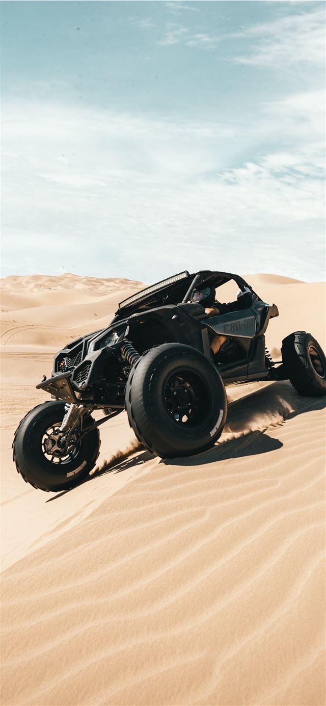 1125x2436 black and gray sports bike on brown sand - car iPhone X Wallpaper