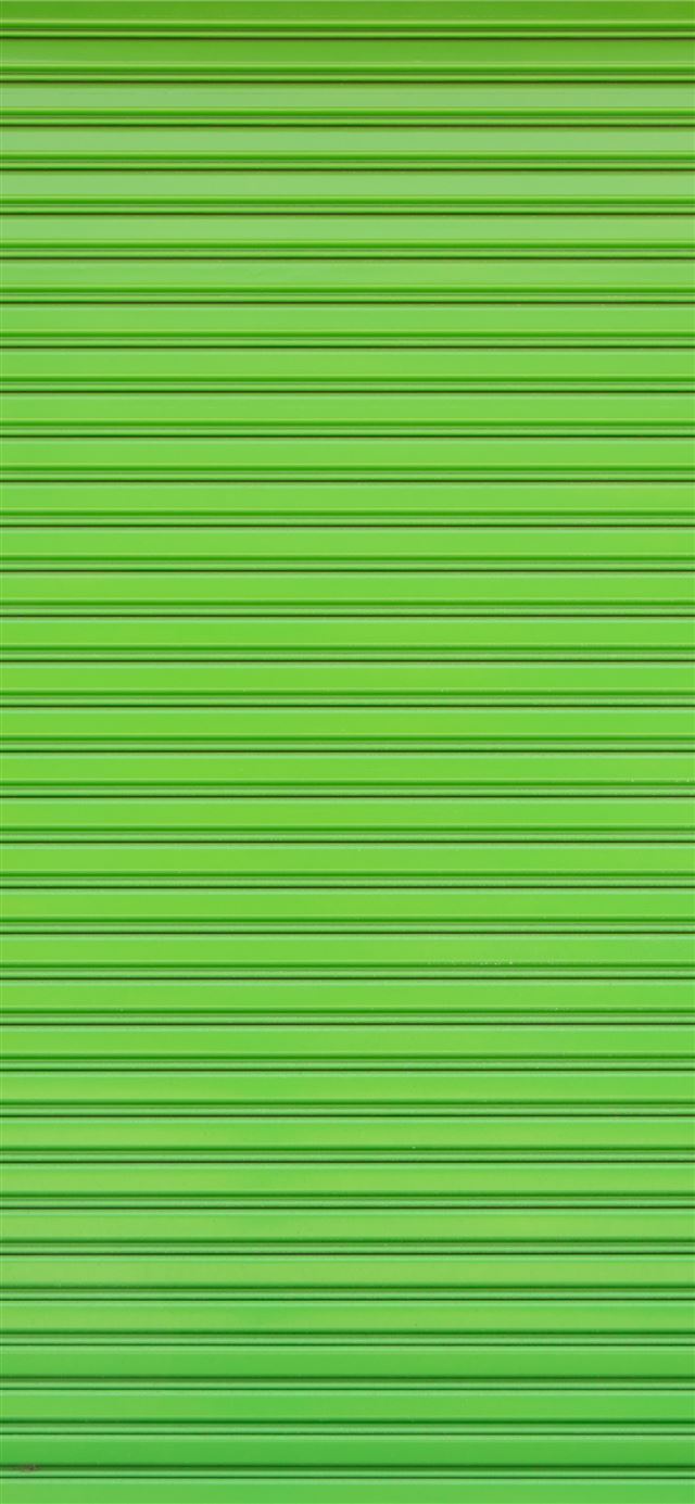 1125x2436 Green roller shutter of a warehouse - window iPhone X Wallpaper