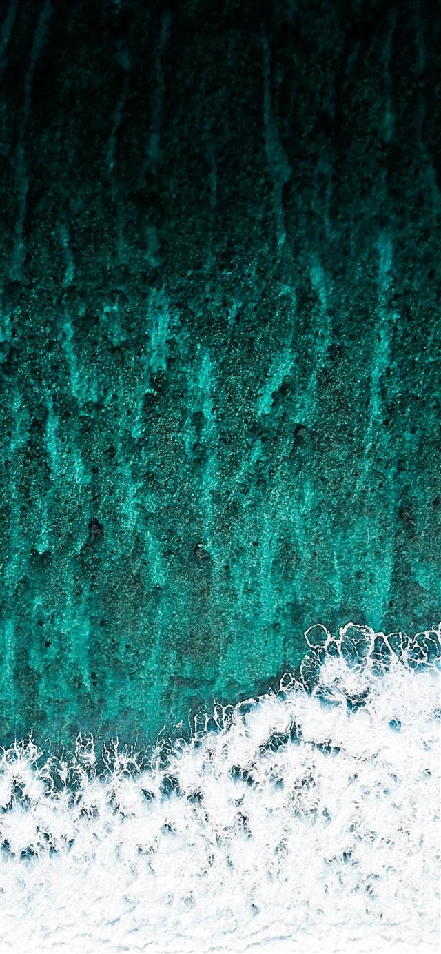 1125x2436 aerial photography of ocean during daytime - water iPhone X Wallpaper